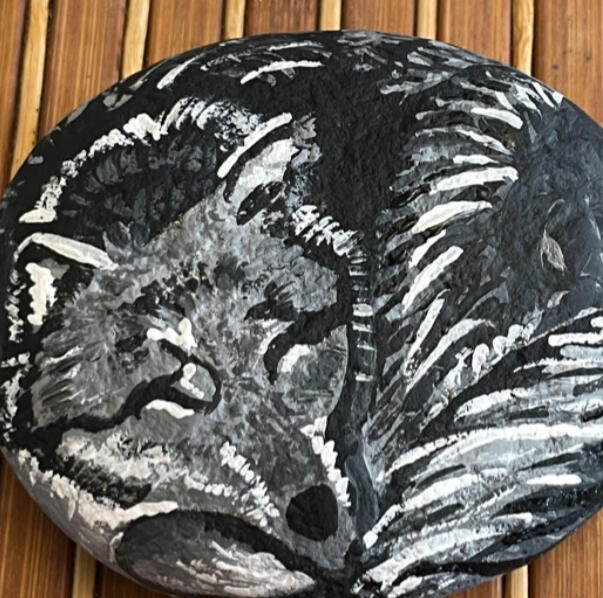 Wolf - Humility Medium: Acrylic on Rock Dimensions: 3.5 in x 3.5 in Date: 2024 Wolf - Humility Medium: Acrylic on Rock Dimensions: 3.5 in x 3.5 in Date: 2024
