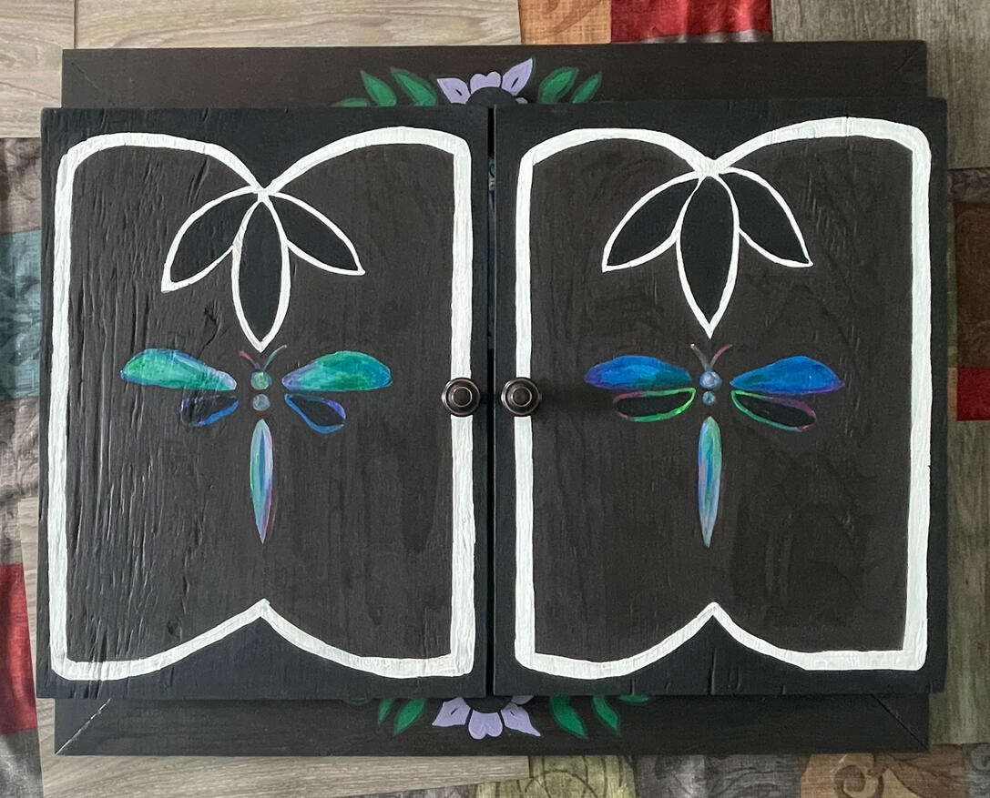 Lewis Hills (Closed view) Dimensions: 28 in x 32 in Medium: Acrylic and Beadwork on canvas, housed in wooden cabinet Date: 2025 Lewis Hills (Closed view) Dimensions: 28 in x 32 in Medium: Acrylic and Beadwork on canvas, housed in wooden cabinet Date: 2025